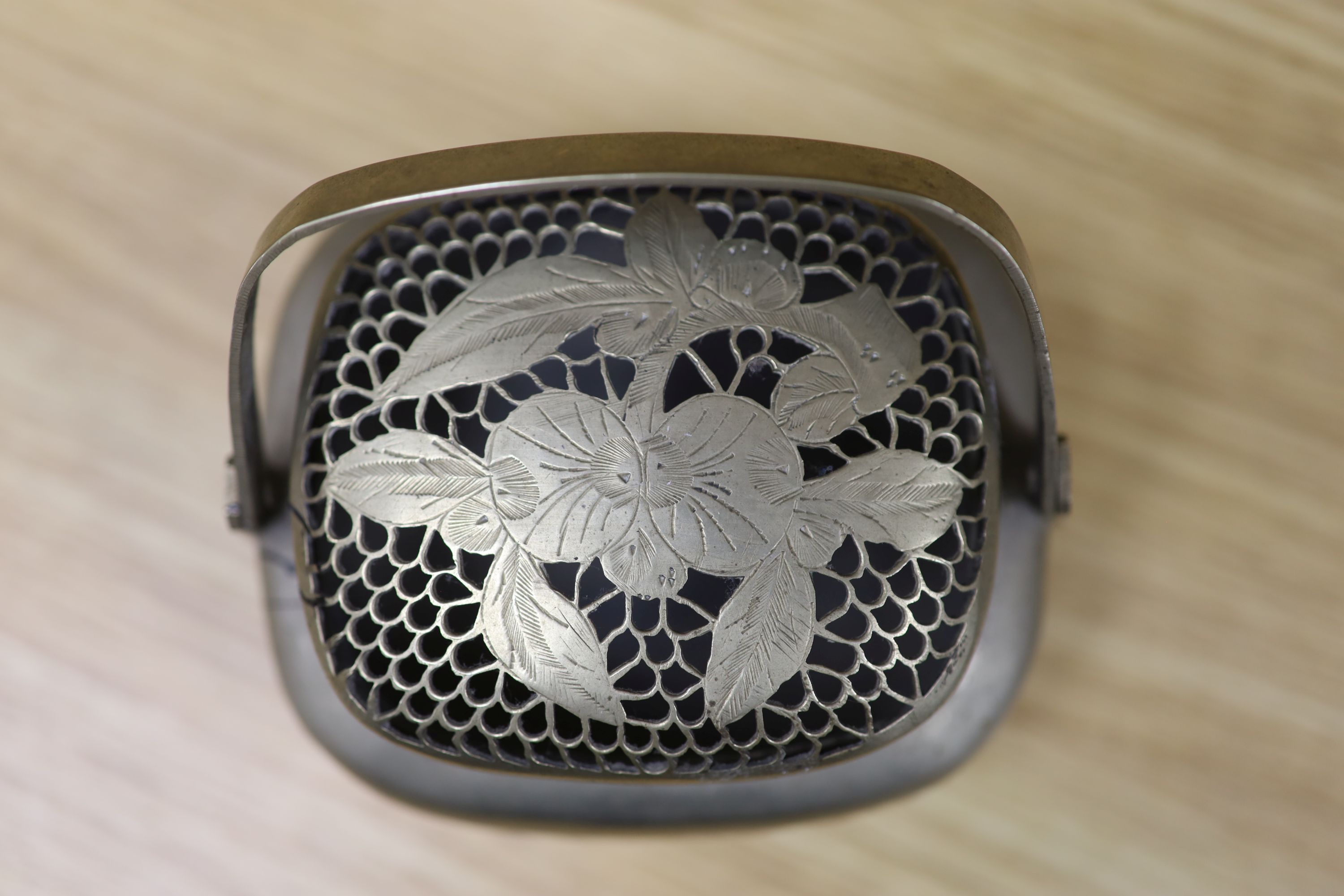 A Chinese lacquer and composition dish and a bronze hand warmer, length 27cm